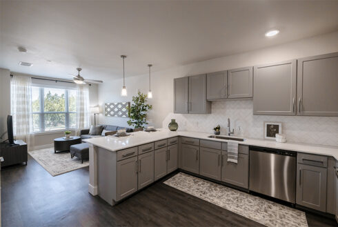 Large kitchen with view of the living room