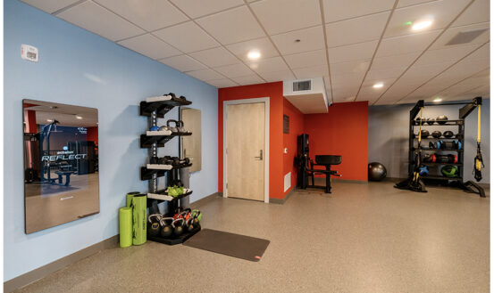 Fitness center with weight lifting equipment