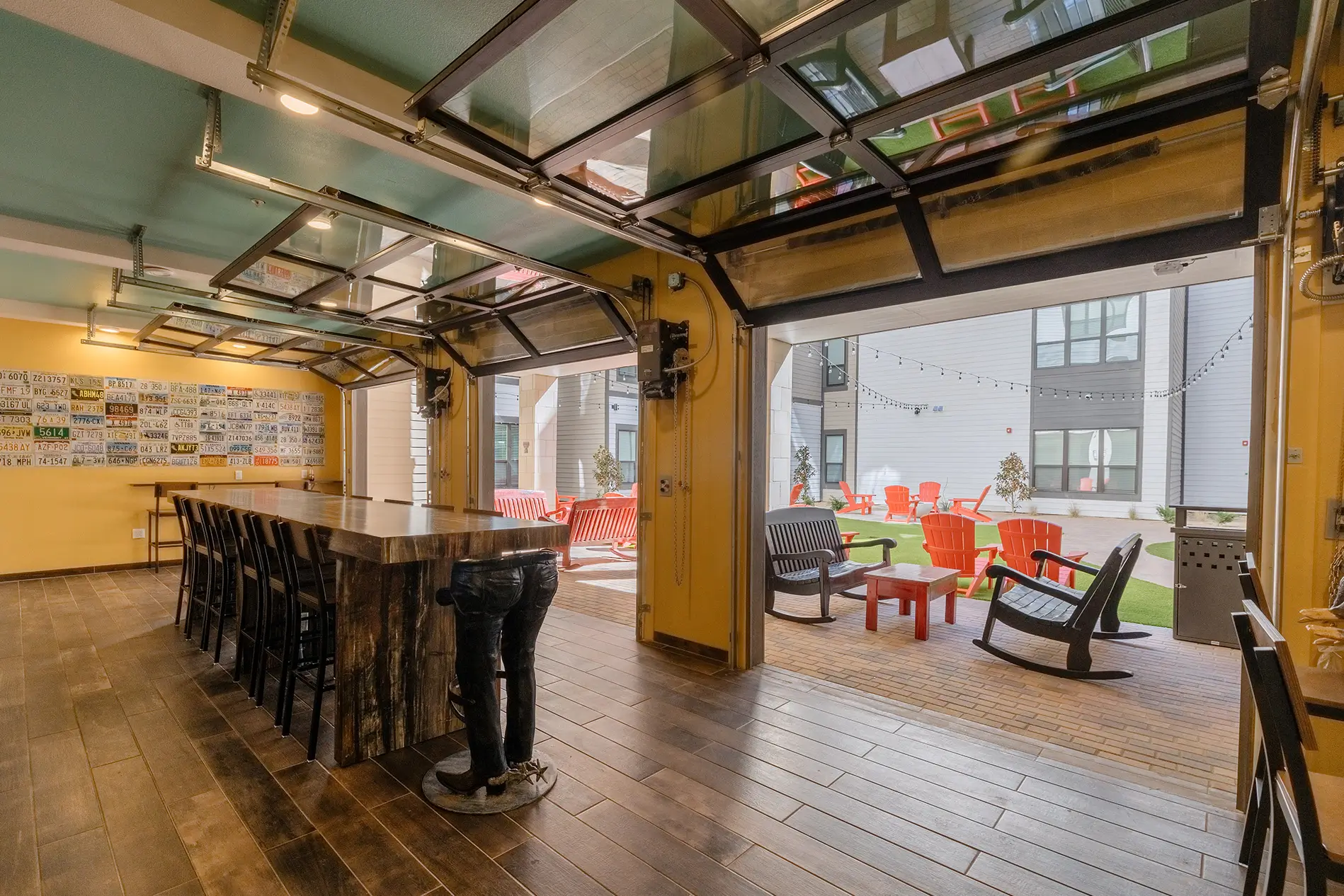 Indoor BYO bar with stools and a painted mural