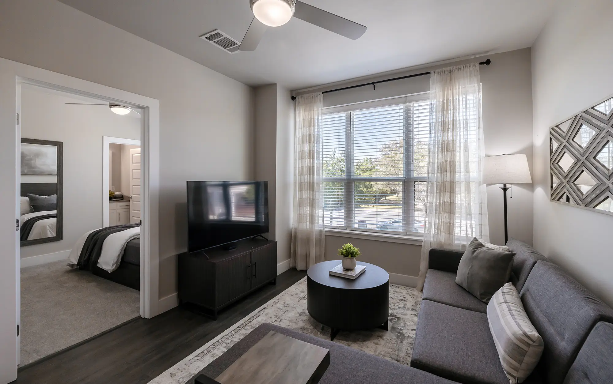 Furnished living space and entrance to bedroom
