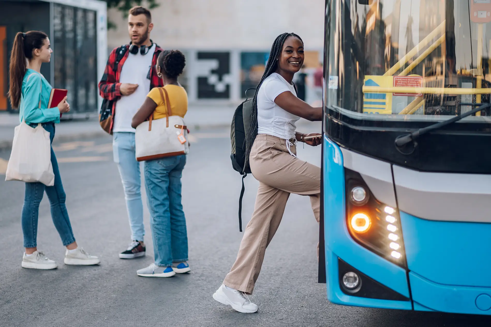 woman getting on a public bus